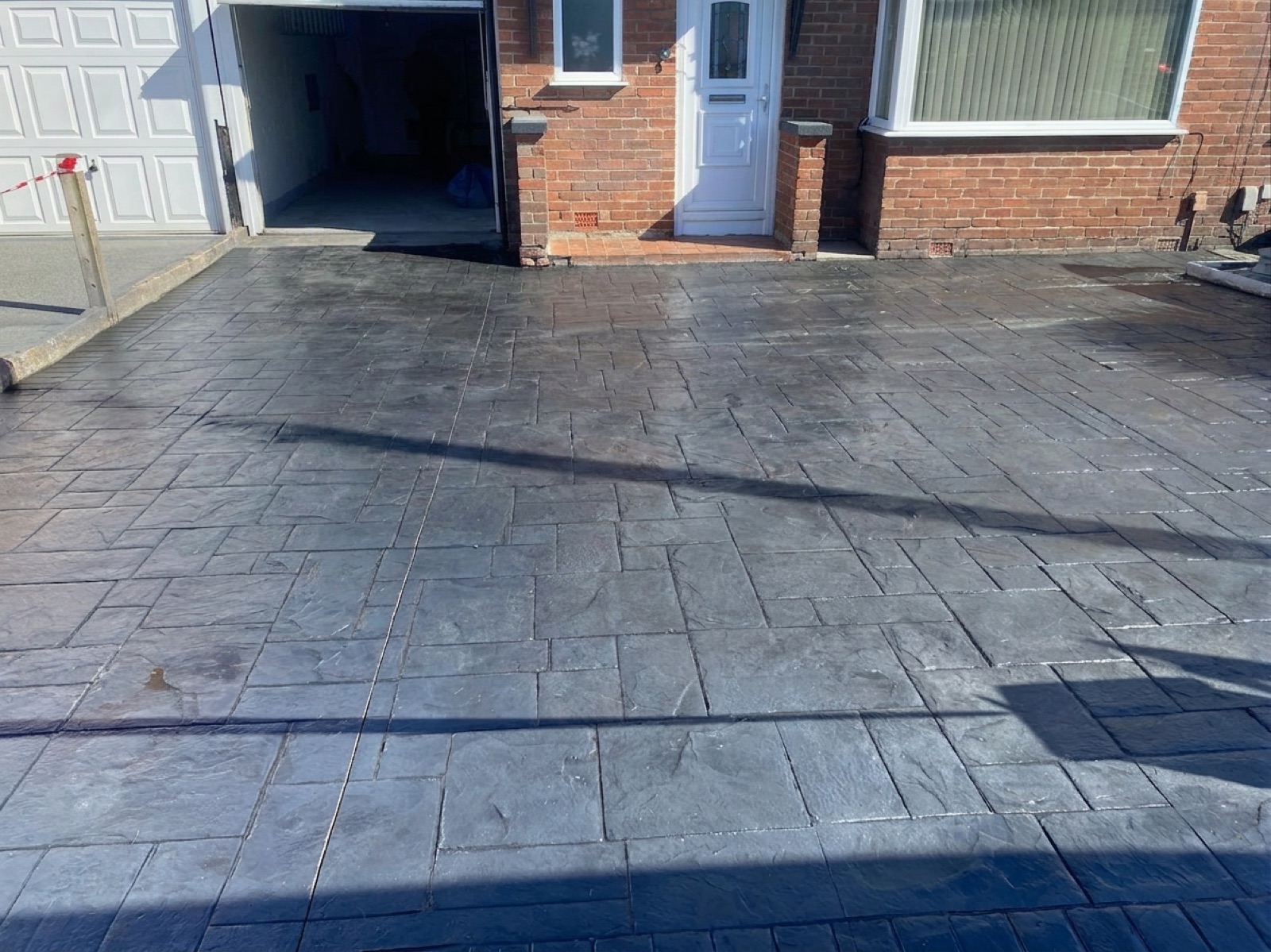 Finished imprinted concrete driveway